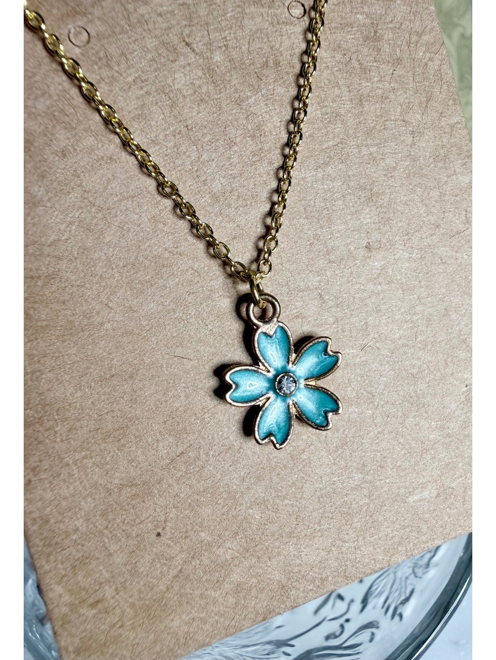Delicate Gold Tone Necklace with Blue Flower Pendant and Rhinestone Center